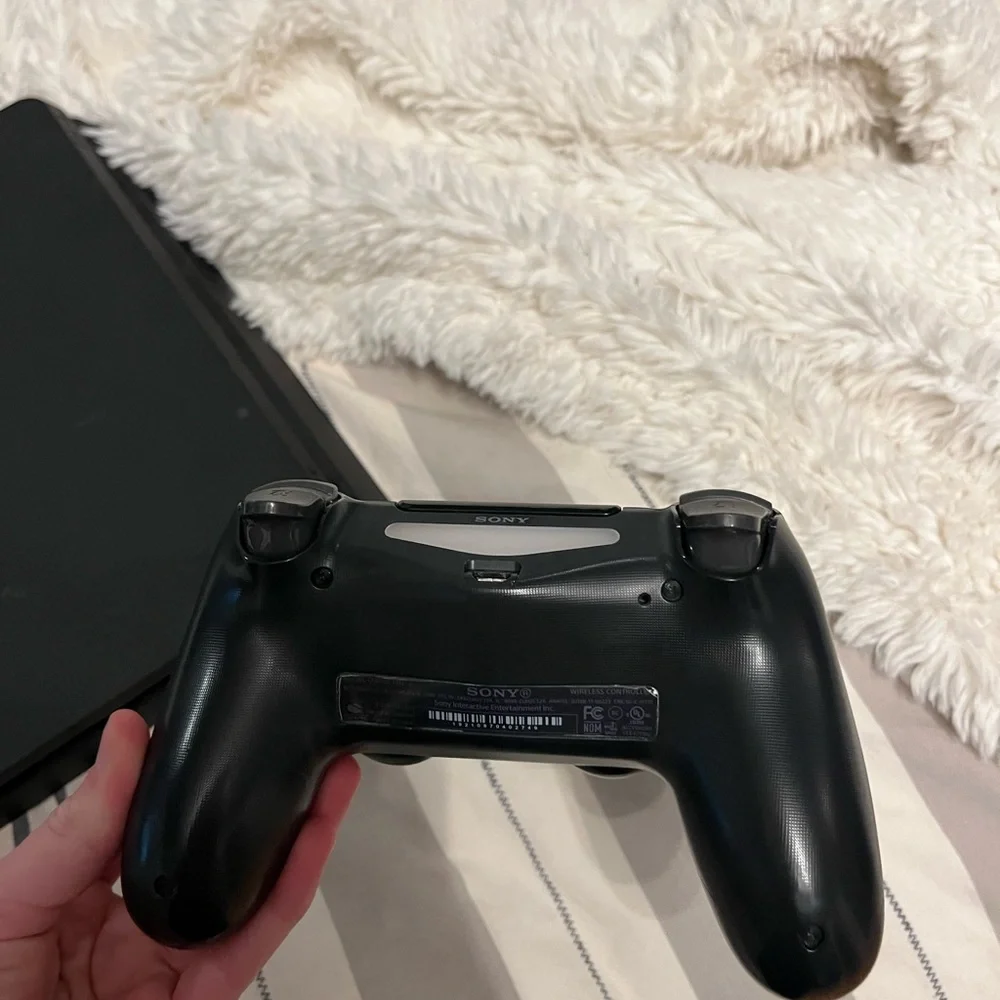 Sony Console with Black Controller